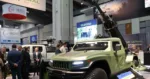 AUSA 2025: AM General Redefines Light Artillery with Next-Gen Hawkeye 105mm Mobile Howitzer.