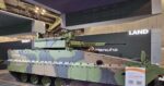 South Korea’s Hanwha debuts K-NIFV infantry fighting vehicle with AI drone defense.